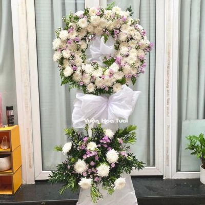 Vòng Hoa Chia Buồn Hồng Trắng 2 Mẫu lãng hoa chia buồn kết hợp màu trắng và tím